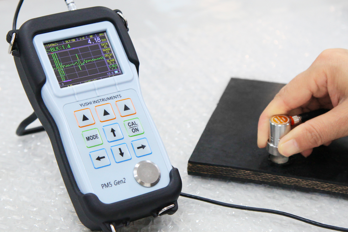 Measure the thickness of thin rubber coatings on reinforced layers