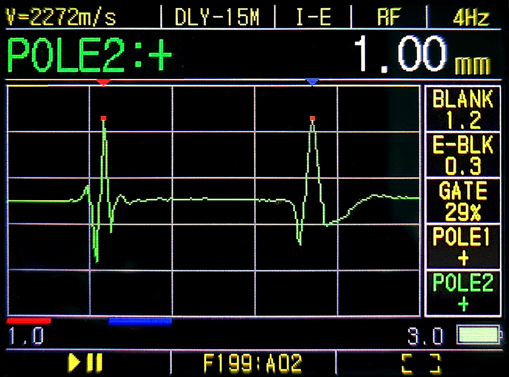 Positive peak echo between plastic and steel interface